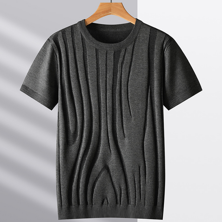 Men's charcoal textured knit tee with unique sculpted woodgrain design. Casual, breathable men's fashion.