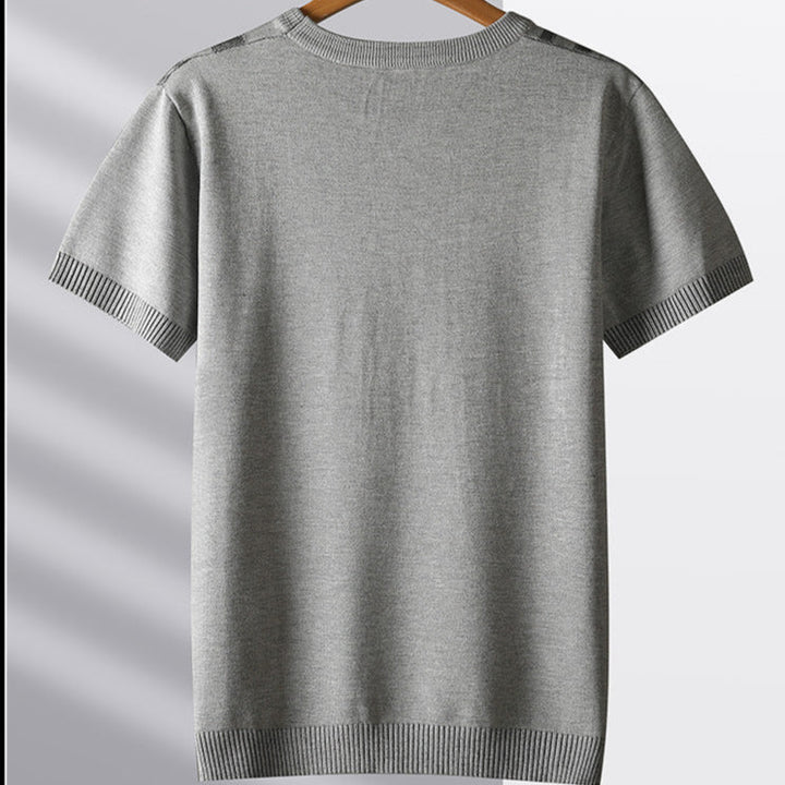 Black men's knit tee, a casual textured shirt with a unique sculpted woodgrain design. Breathable men's fashion.