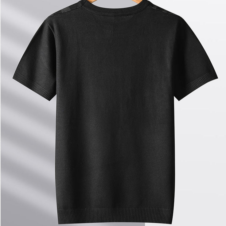 Distinctive men's textured knit tee in gray, featuring a sculpted woodgrain pattern. Unique casual men's fashion.