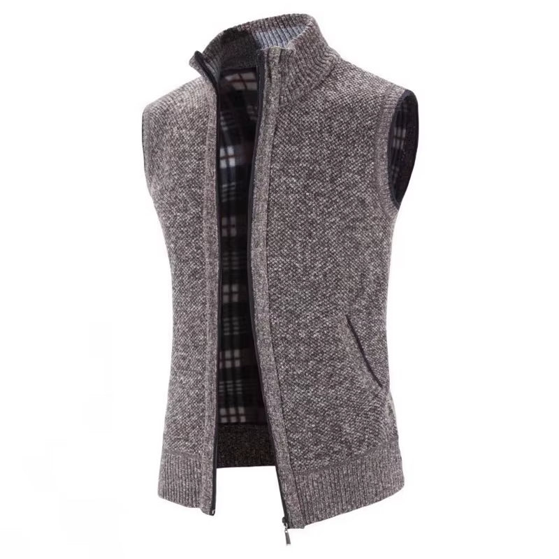 Men's comfortable gray wool vest, full-zip front, revealing a unique plaid pattern lining. Ideal outerwear.