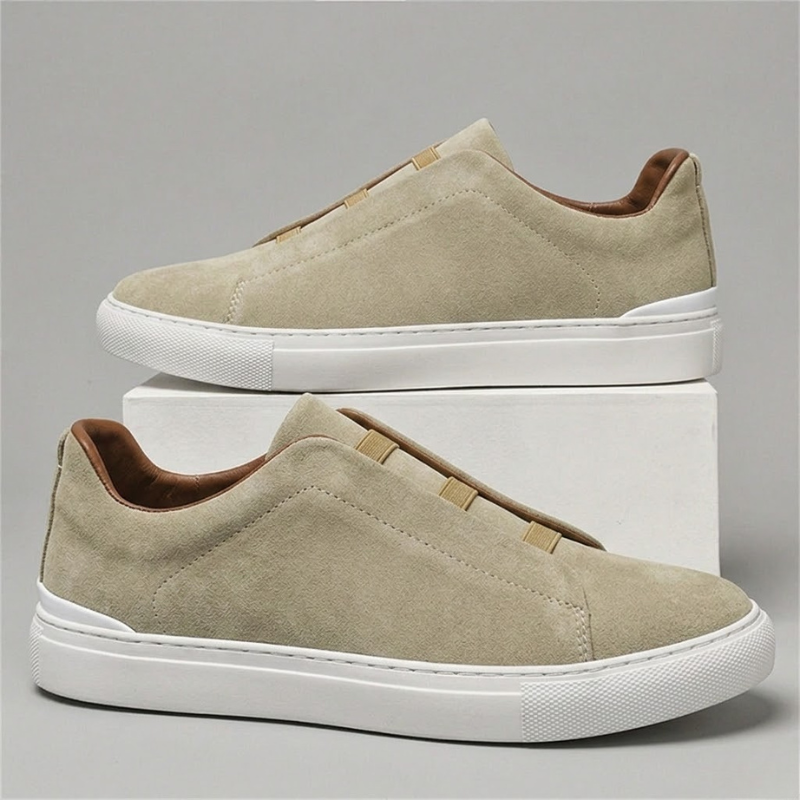 Black men's Chelsea sneakers, slip-on style. Versatile, comfortable, and stylish for casual & everyday wear.