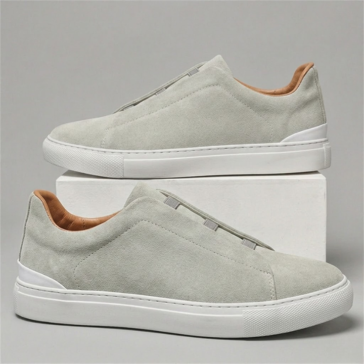 Effortless men's Chelsea sneakers. Contemporary slip-on design for all-day comfort & sophisticated style.