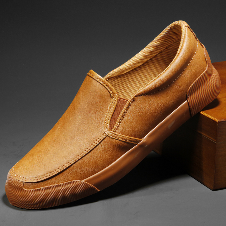 Men's Chelsea style slip-on sneakers for casual everyday wear. Comfortable men's fashion footwear.