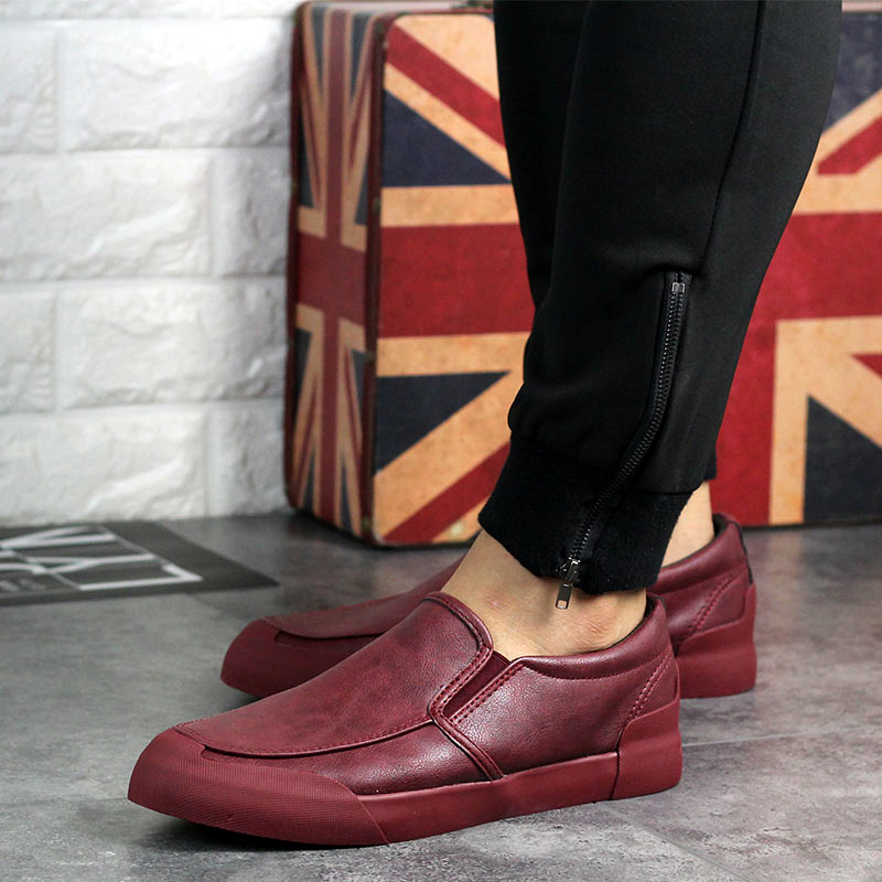 Black men's Chelsea style slip-on sneakers, essential comfortable casual footwear for everyday wear.