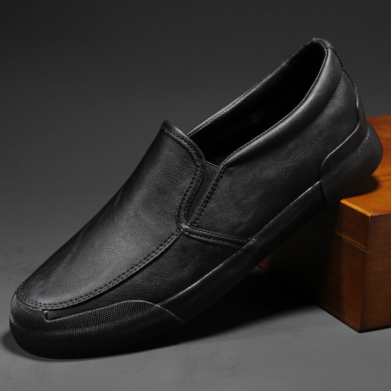 Brown men's Chelsea style slip-on sneakers. Modern, comfortable casual shoes for men's everyday fashion.