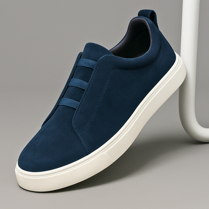 Comfortable men's fashion sneakers, featuring a sleek slip-on design & elastic Chelsea side panels.