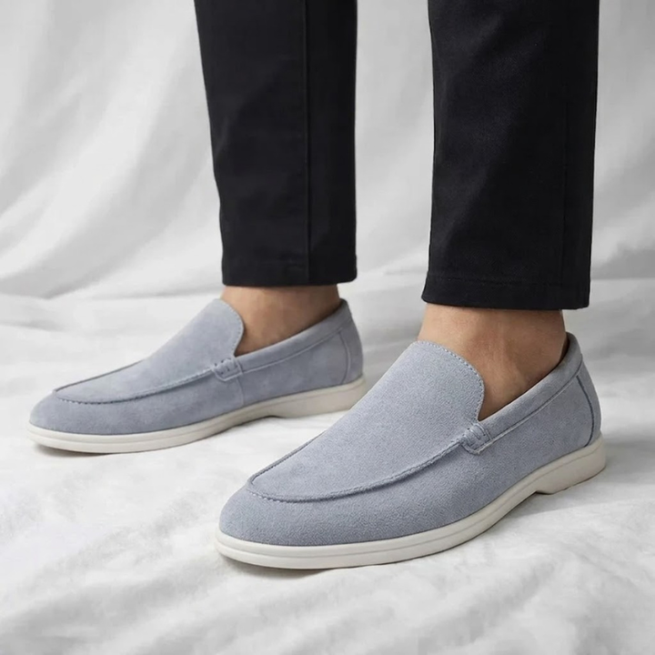 Men's Chester slip-on loafers showcasing a durable rubber sole & plush interior for comfort.