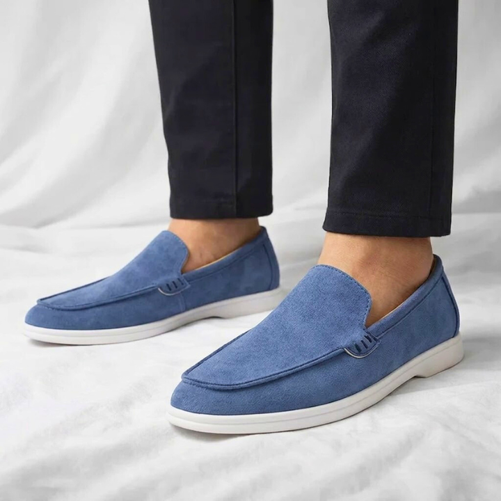 Comfortable brown slip-on loafers for men, ideal for casual outfits or dressy occasions.