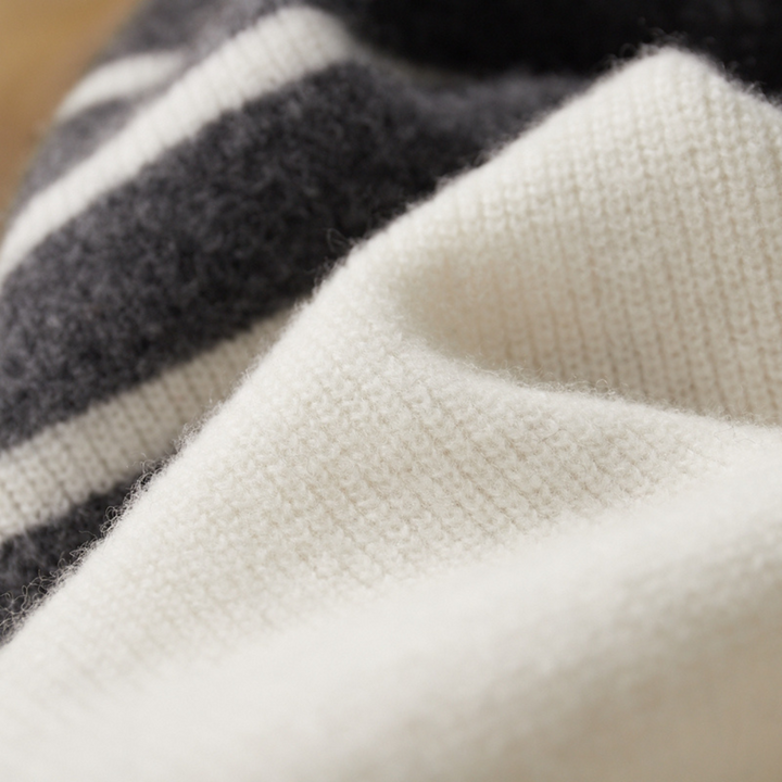 Modern men's striped fashion set: soft knit top and pants for comfort and effortless style.