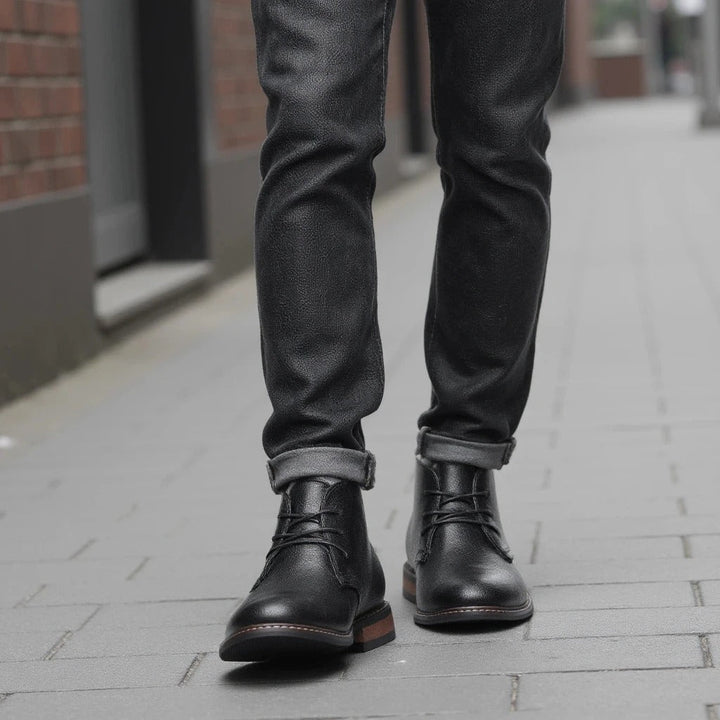 Classic yet modern men's black chukka boots with a comfortable grip sole for versatile styling and men's footwear.