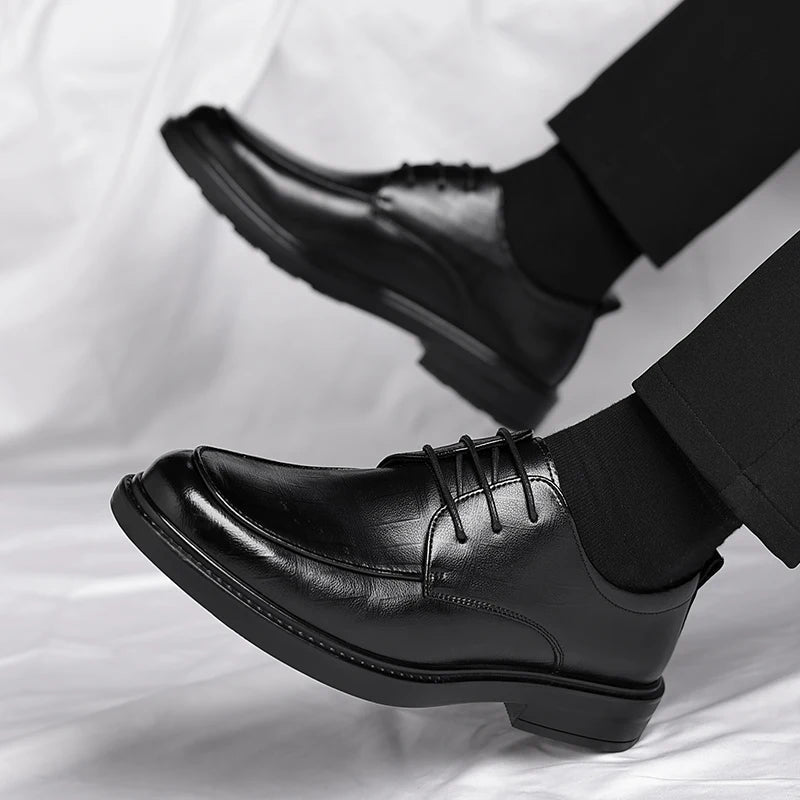 Elegant brown leather lace-up dress shoes for men, perfect for professional attire & sophisticated style.