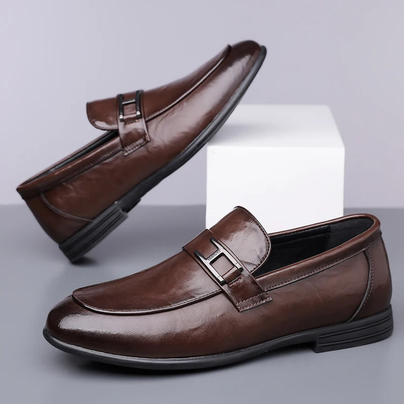 Detailed view of elegant laces on men's black leather dress shoes, emphasizing classic and sophisticated style.