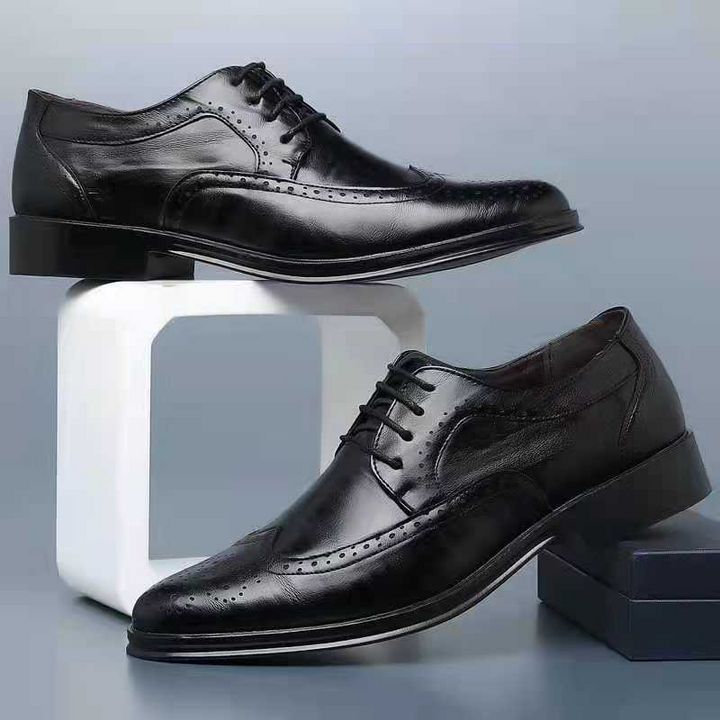 Men's classic black leather pointed toe dress shoes for formal events & business attire, sophisticated & elegant footwear.