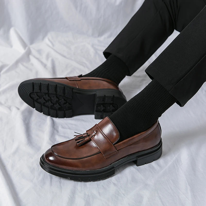 Men's classic black tassel loafers. Comfortable & elegant slip-on footwear for formal & casual wear.