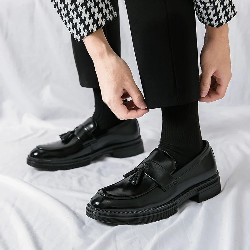 Men's classic brown leather tassel loafers. Comfortable smart casual slip-ons for everyday style.