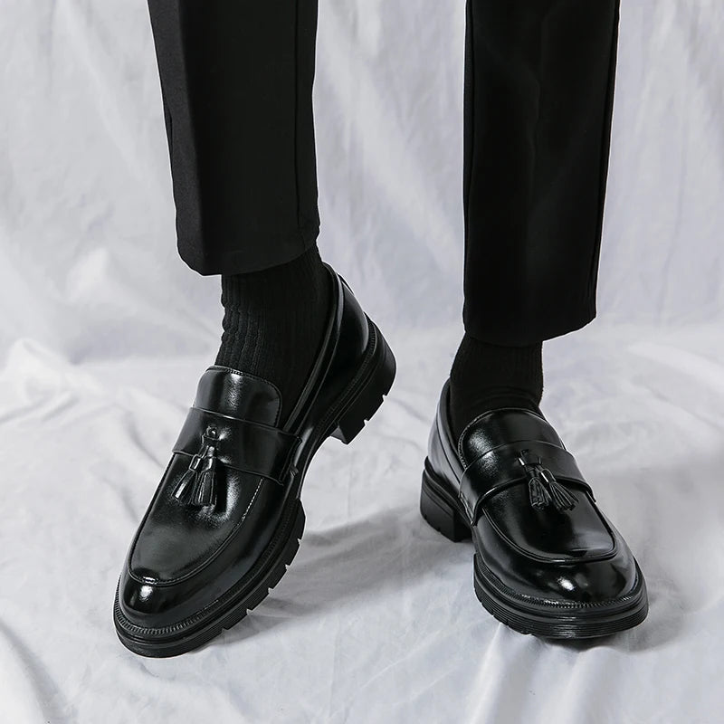 Men's classic brown tassel loafers, versatile for formal, business & smart casual outfits. Slip-on comfort.