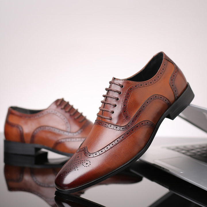 Men's classic black Oxford brogue dress shoes for formal events & business comfort.