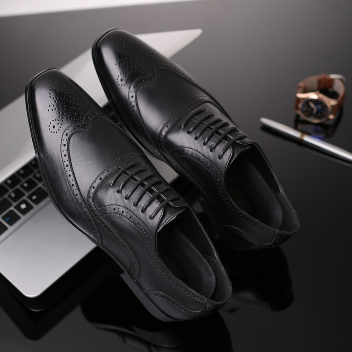 Stylish men's black leather brogue Oxford shoes, suitable for business & elevated fashion.