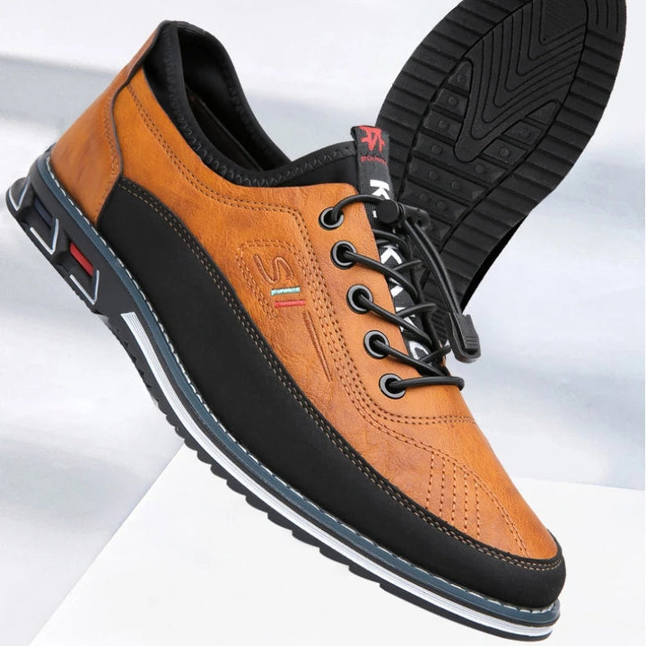 Elegant men's leather Oxford dress shoes with refined stitching, offering a sleek and timeless look for business casual.