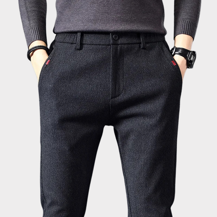 Navy blue slim fit men's pants, offering everyday comfort and a stylish look for any occasion.
