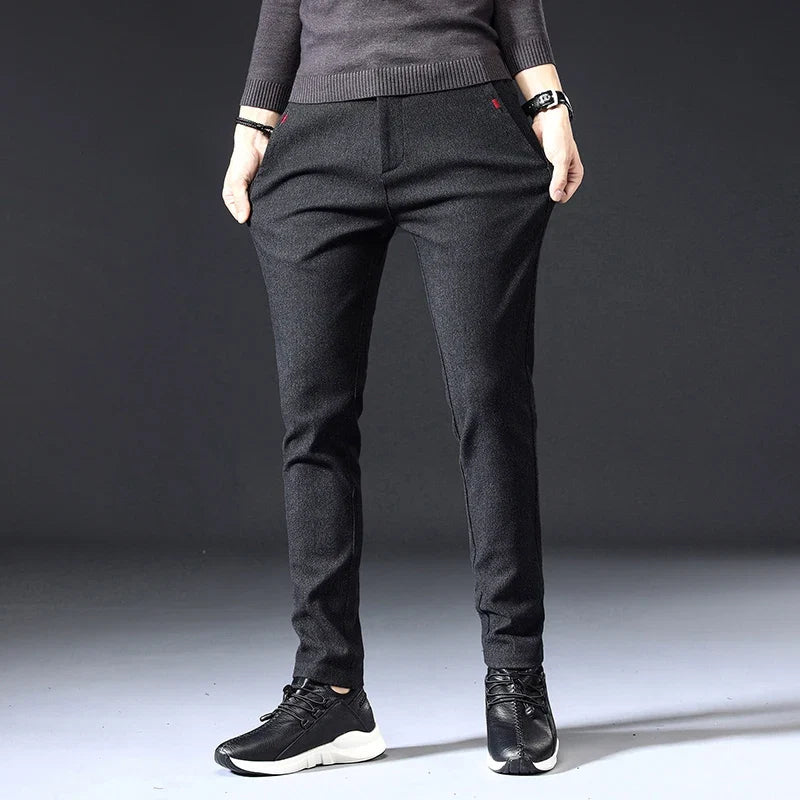 Classic navy blue slim fit pants for men, blending modern style with ultimate comfort and versatility.