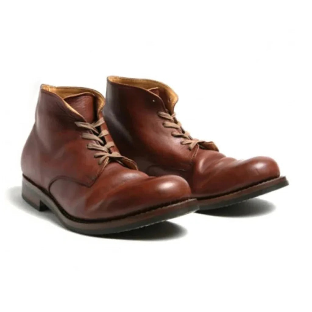 Comfortable men's brown slip-on ankle boots. Durable, eco-friendly, and perfect for casual everyday or winter wear.