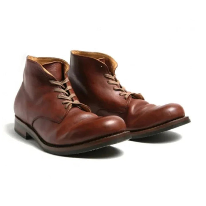 Comfortable men's brown slip-on ankle boots. Durable, eco-friendly, and perfect for casual everyday or winter wear.