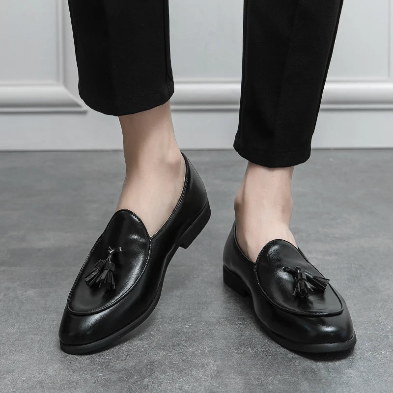 Stylish men's slip-on tassel loafers. Classic design for a refined, modern gentlemen's look.
