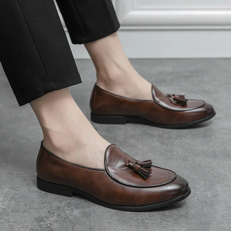 Premium leather men's tassel loafers. Durable classic dress shoes for timeless men's style.