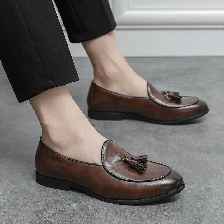 Premium leather men's tassel loafers. Durable classic dress shoes for timeless men's style.
