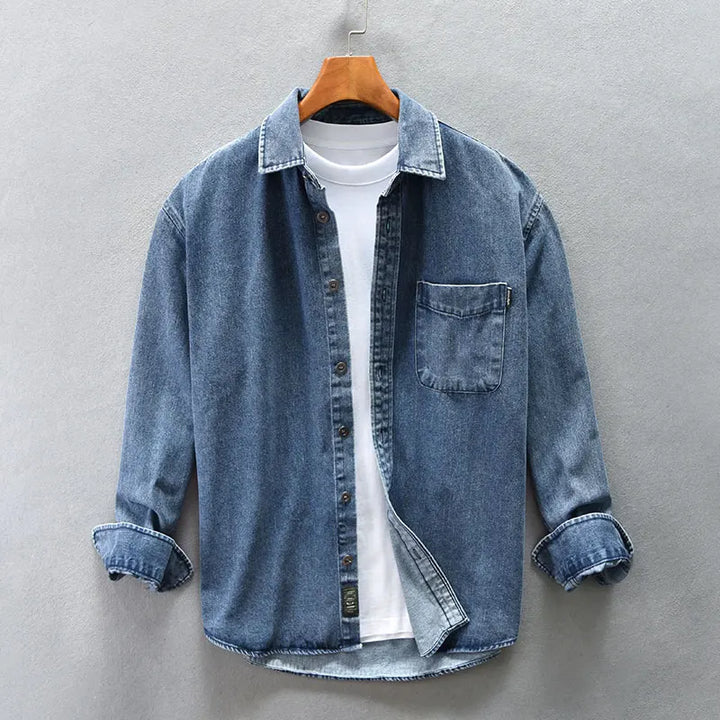 Stylish men's black denim shirt, long sleeve, button-up. A versatile top for a modern casual look.