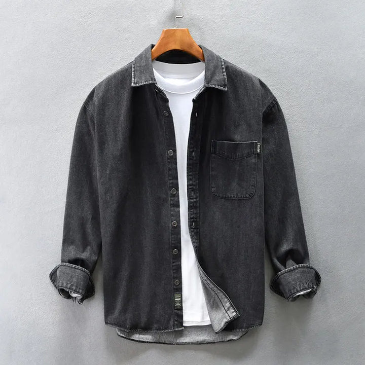 Classic men's blue denim button-up shirt, long sleeve, ideal for comfortable casual wear.