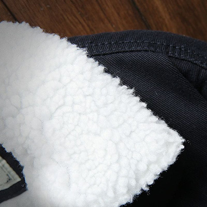 Durable men's blue denim jacket with classic design, essential winter outerwear for versatile everyday fashion.