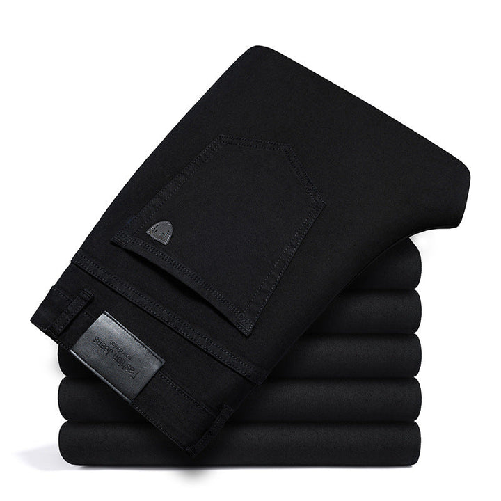 Folded stack of men's classic blue stretch denim jeans, ideal for comfortable, stylish everyday fashion.