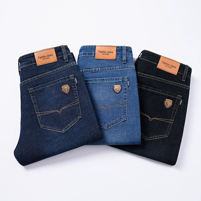 Textured view of men's classic stretch denim jeans, emphasizing durable fabric & comfortable fit.