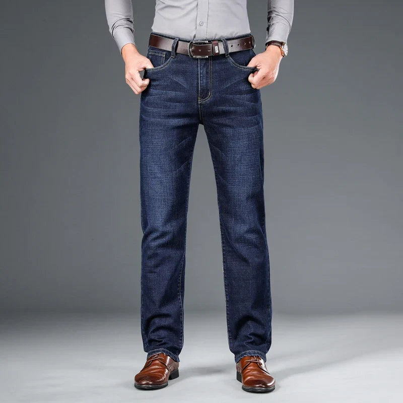 Side view of men's classic stretch denim jeans, structured fit for lasting comfort & stylish denim.
