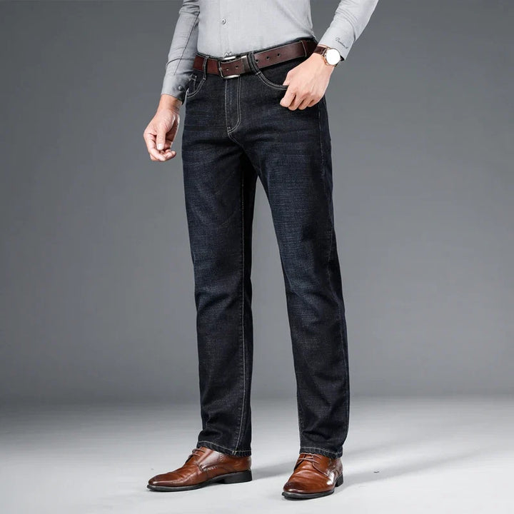 Waistband & button detail on men's classic stretch denim jeans, secure fit, perfect for casual wear.
