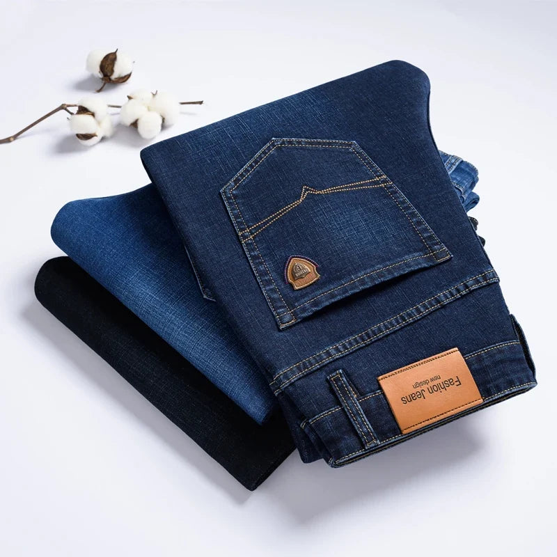 Back pocket & stitching detail of men's blue stretch denim jeans, classic design, practical & stylish.
