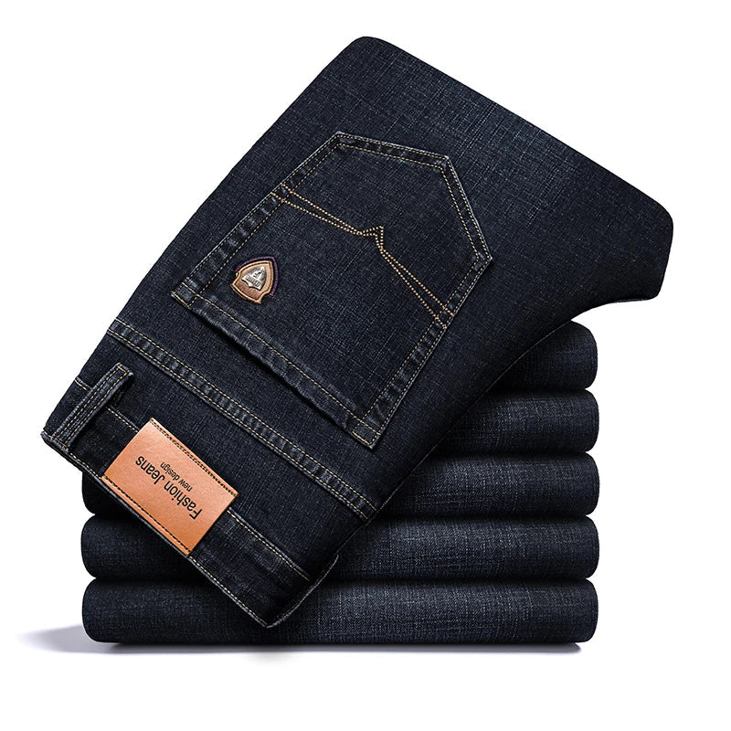 Leg & hem detail of men's classic stretch denim jeans, sturdy stitching, ensuring lasting comfort.