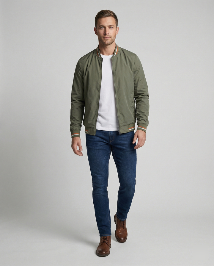 Versatile men's bomber jacket, perfect for fall & spring. Ribbed trim adds a classic touch.