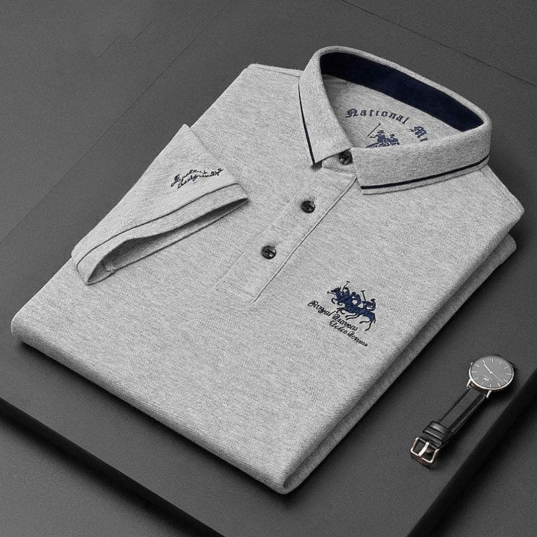 Men's casual polo shirt featuring intricate embroidery & breathable fabric. Classic style for daily comfort.