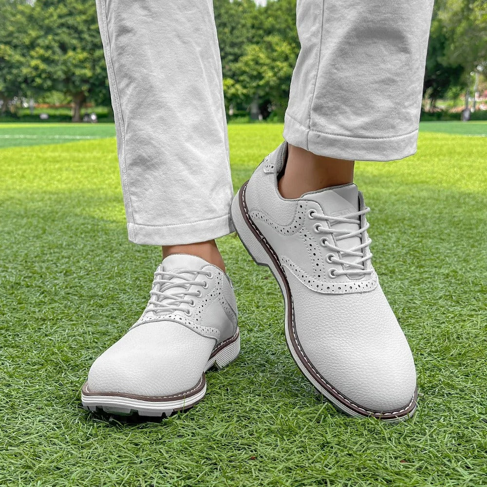 Stylish men's classic brogue golf shoes, spiked for performance, comfortable leather design.