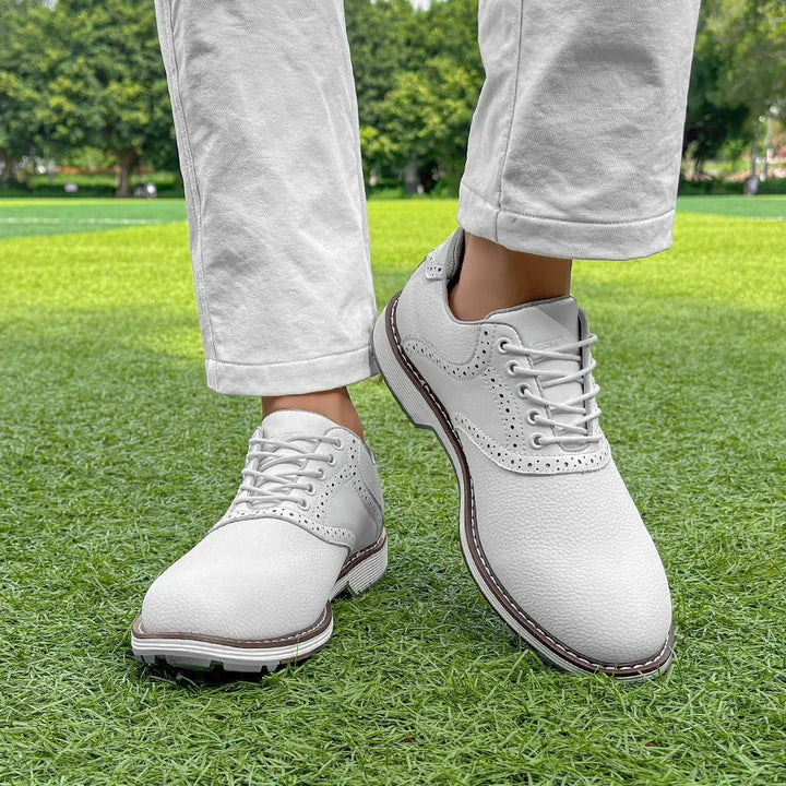 Stylish men's classic brogue golf shoes, spiked for performance, comfortable leather design.