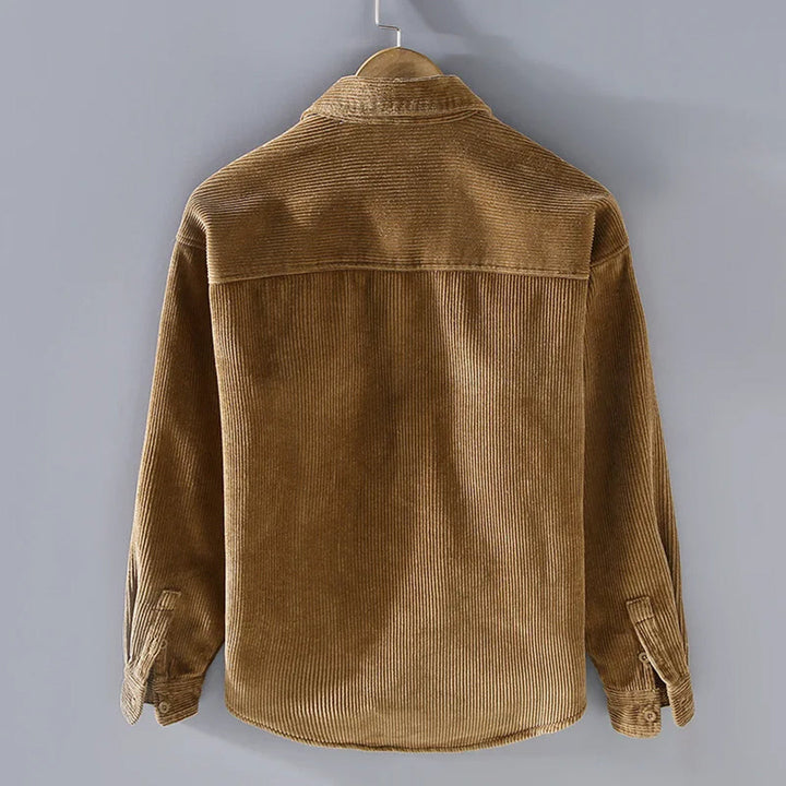 High-quality men's vintage-style corduroy jacket. Durable, warm outerwear for a timeless and stylish look.