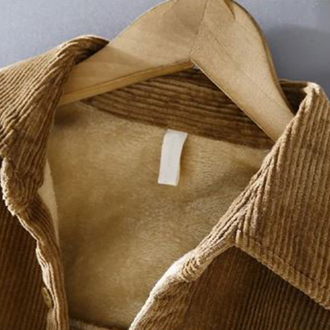 Rugged yet refined men's corduroy jacket, offering warm and stylish outerwear for a sophisticated fall outfit.