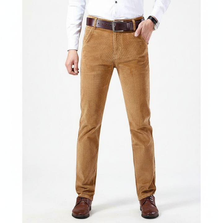 Close-up of men's corduroy pants fabric, classic brown cotton blend