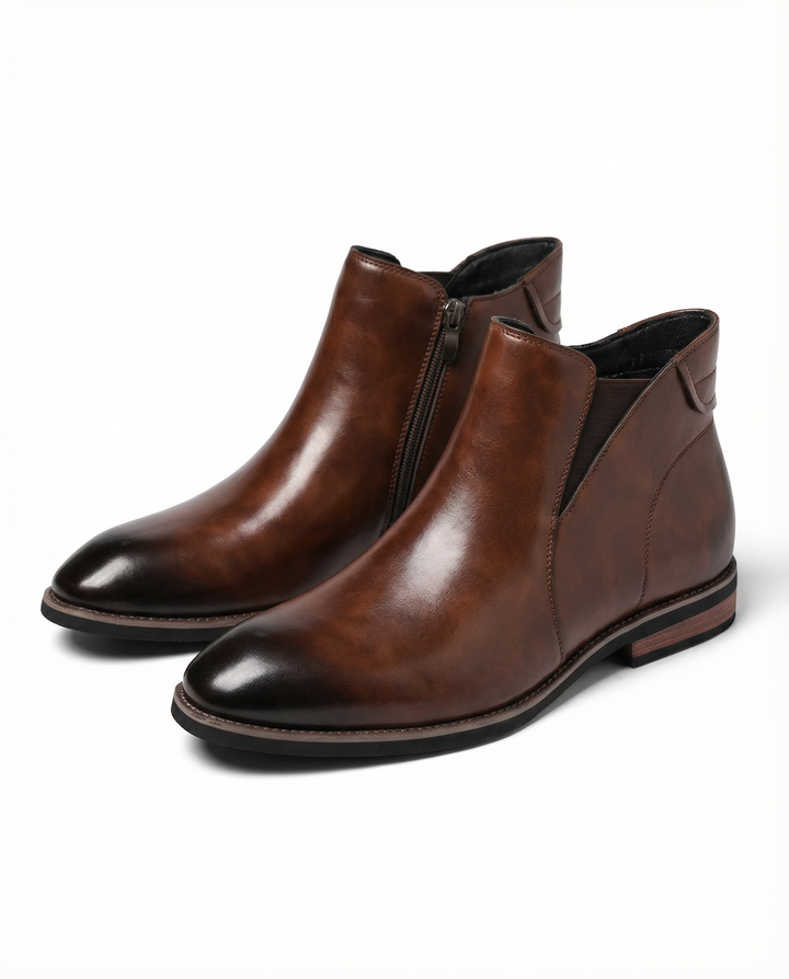 Men's classic brown leather Chelsea boots with comfortable side zip, ideal for smart-casual fashion & durability.