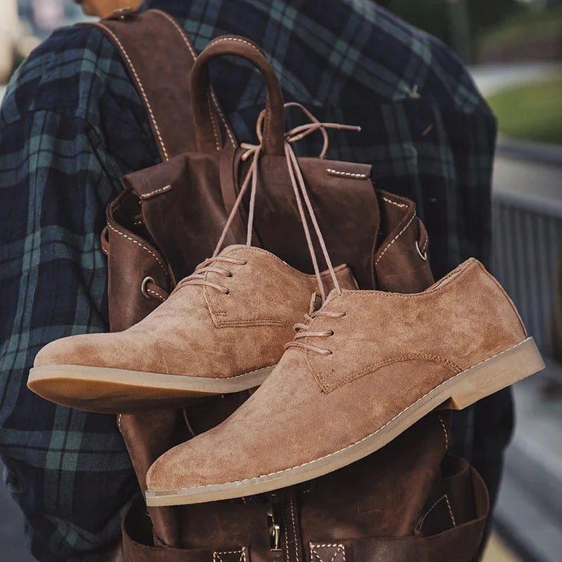 Men's classic brown leather lace-up Derby shoes, perfect for versatile dress or casual everyday wear. Effortless style.