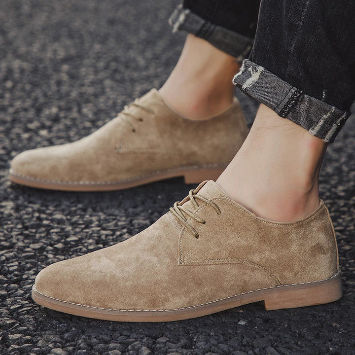 Stylish black men's lace-up Derby dress shoes, offering a classic and sophisticated look for formal or smart casual events.