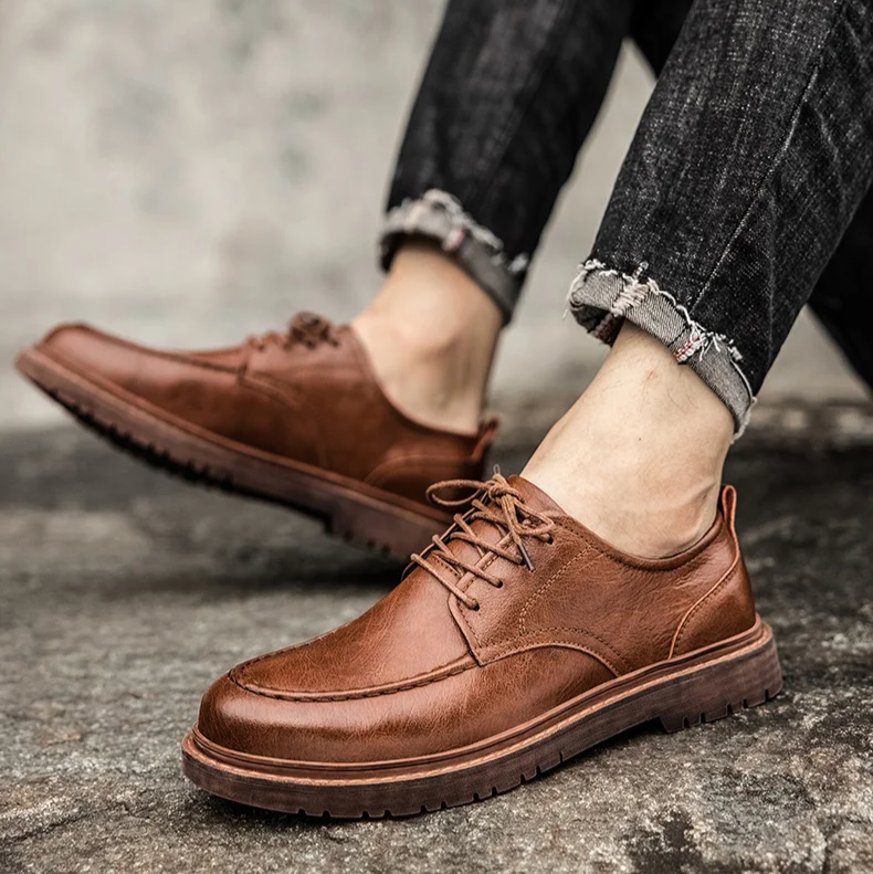 Sleek black men's classic lace-up Derby shoes for formal occasions. Stylish, durable, and comfortable leather footwear.